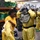 Sailors suit up in full personal protective equipment
