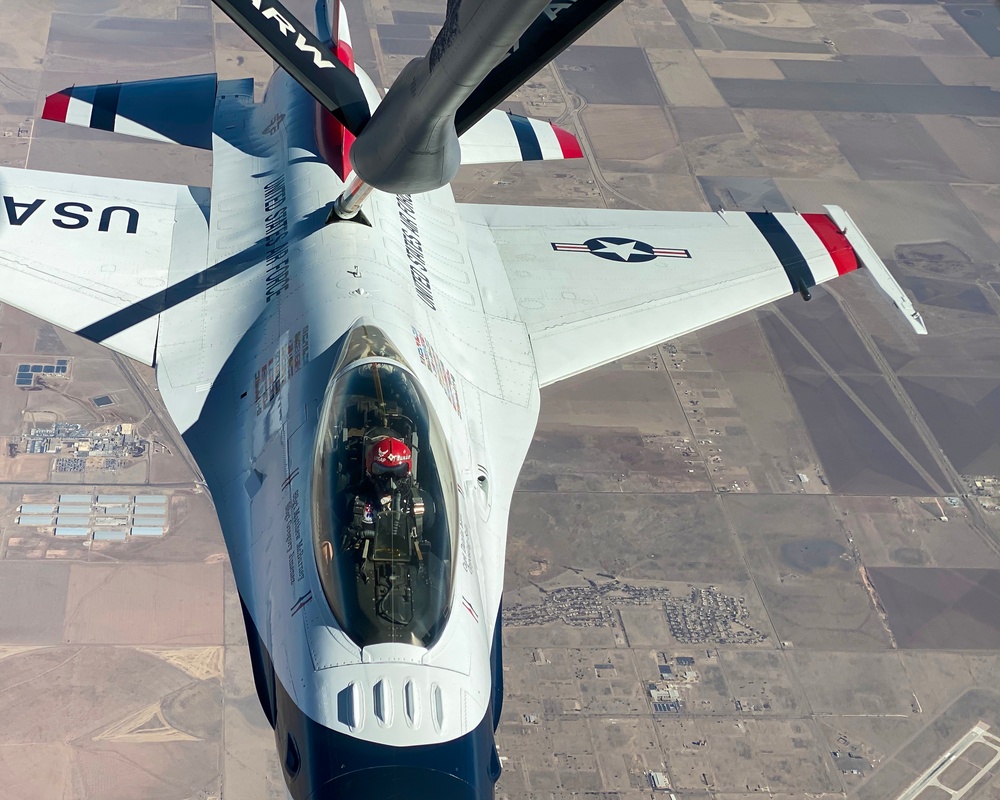 91st Air Refueling Squadron preforms Grand Prix flyover