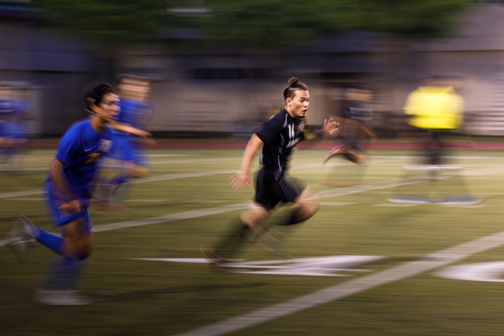 A player was running on the pitch for the team like wind in the soccer game at Zama High School on Apr 27,  2021.