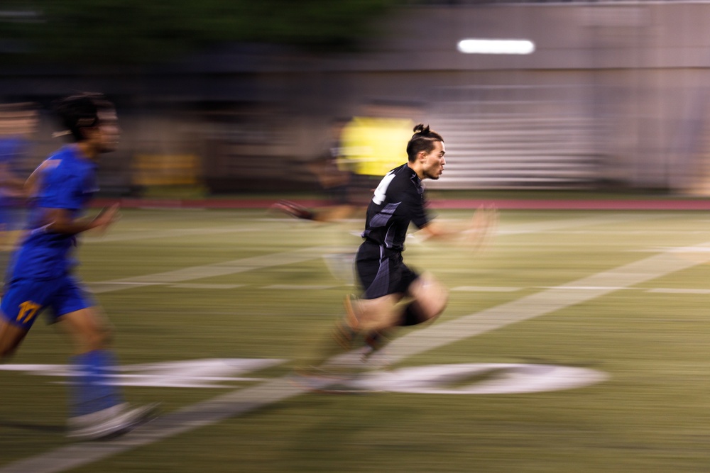 A player was running on the pitch for the team like wind in the soccer game at Zama High School on Apr 27,  2021.