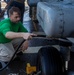 Sailors Aboard USS Ralph Johnson (DDG 114) Conduct a Helicopter Wash Down