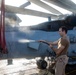 Sailors Aboard USS Ralph Johnson (DDG 114) Conduct a Helicopter Wash Down