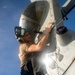 Sailors Aboard USS Ralph Johnson (DDG 114) Conduct a Helicopter Wash Down