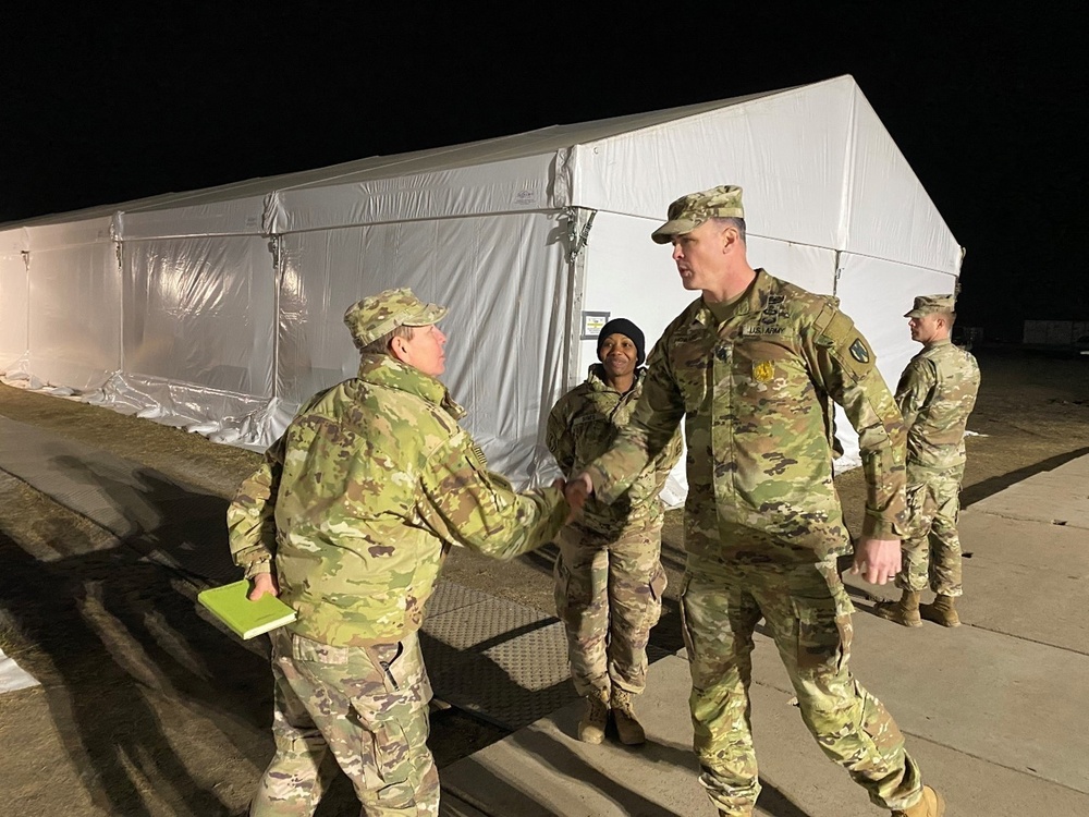 Command Sgt. Maj Sean Howard visits troops in Poland