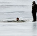 Cold-Weather Operations Course students jump in for cold-water immersion training at Fort McCoy