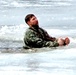 Cold-Weather Operations Course students jump in for cold-water immersion training at Fort McCoy