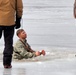 Cold-Weather Operations Course students jump in for cold-water immersion training at Fort McCoy