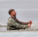 Cold-Weather Operations Course students jump in for cold-water immersion training at Fort McCoy