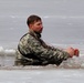 Cold-Weather Operations Course students jump in for cold-water immersion training at Fort McCoy