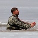 Cold-Weather Operations Course students jump in for cold-water immersion training at Fort McCoy