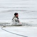 Cold-Weather Operations Course students jump in for cold-water immersion training at Fort McCoy