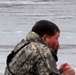 Cold-Weather Operations Course students jump in for cold-water immersion training at Fort McCoy