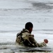 Cold-Weather Operations Course students jump in for cold-water immersion training at Fort McCoy