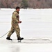 Cold-Weather Operations Course students jump in for cold-water immersion training at Fort McCoy