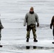 Cold-Weather Operations Course students jump in for cold-water immersion training at Fort McCoy