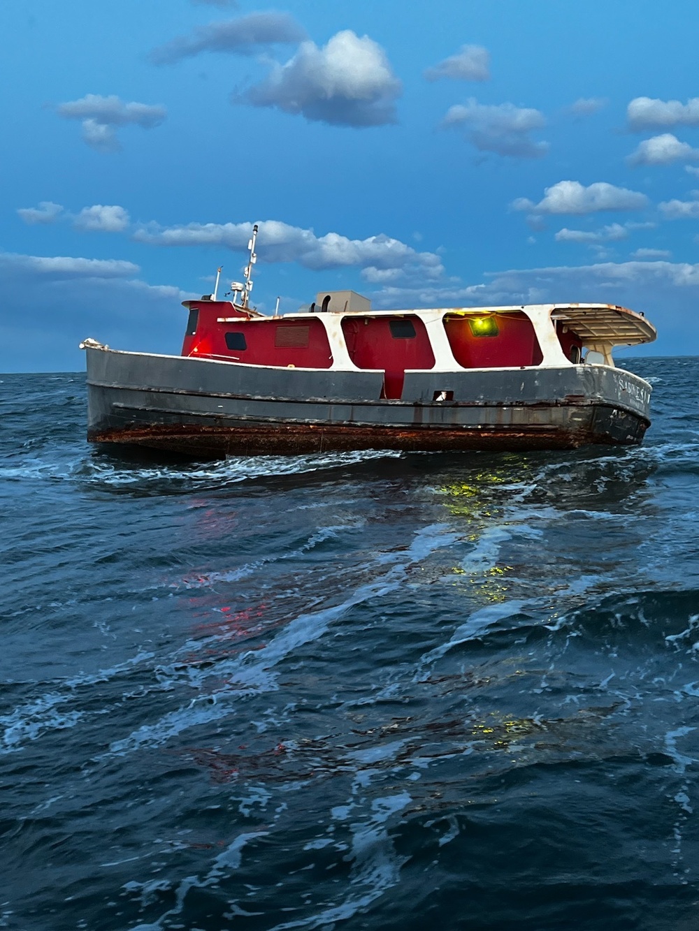 Coast Guard responds to mariners stranded on derelict houseboat near Chesapeake Beach