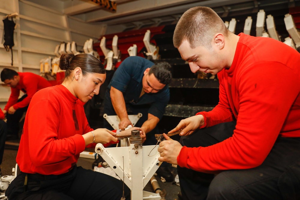 Abraham Lincoln Sailors conduct maintenance