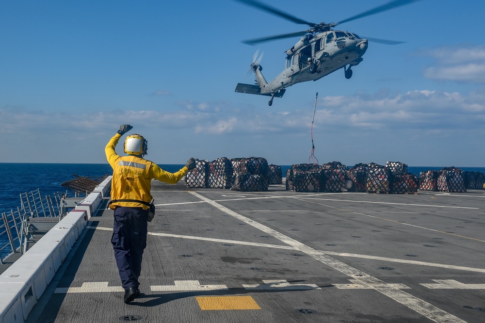 USS Green Bay (LPD 20) Conducts A Replenishment-At-Sea