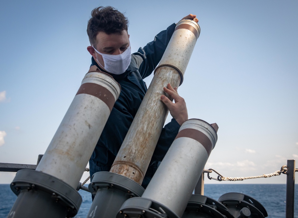 CTT2 Guptill Loads Chaff Aboard Milius