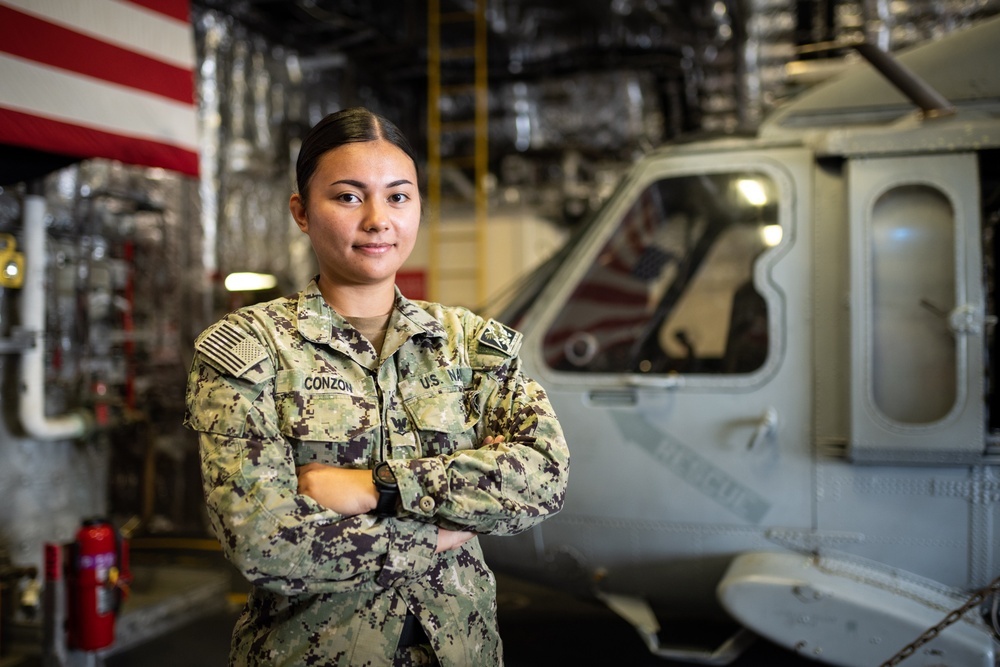 USS Tulsa Sailor poses for portrait