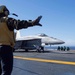 Sailor Directs An F/A-18E Super Hornet