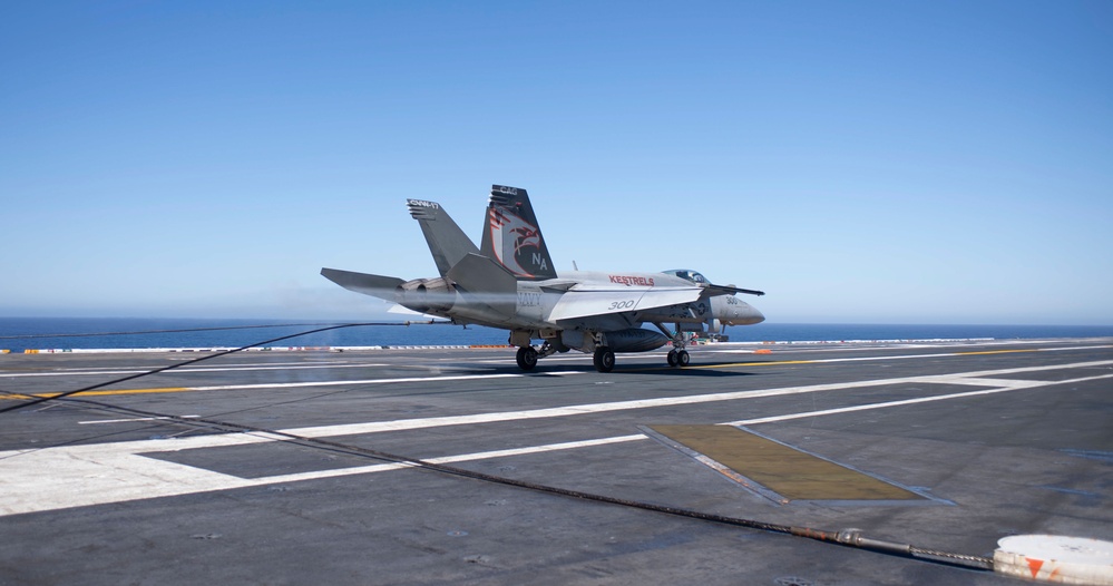 An F/A-18E Super Hornet Lands On The Flight Deck