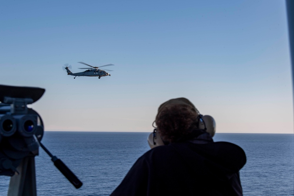 MH-60s Flies By The USS Nimitz