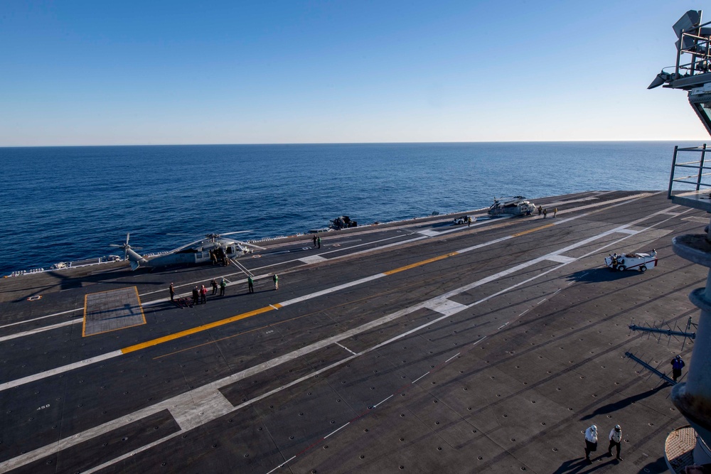 MH-60S Sea Hawks Prepare To Lift Off Of The Flight Deck