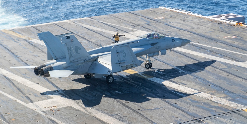 An F/A-18E Taxies On The Flight Deck