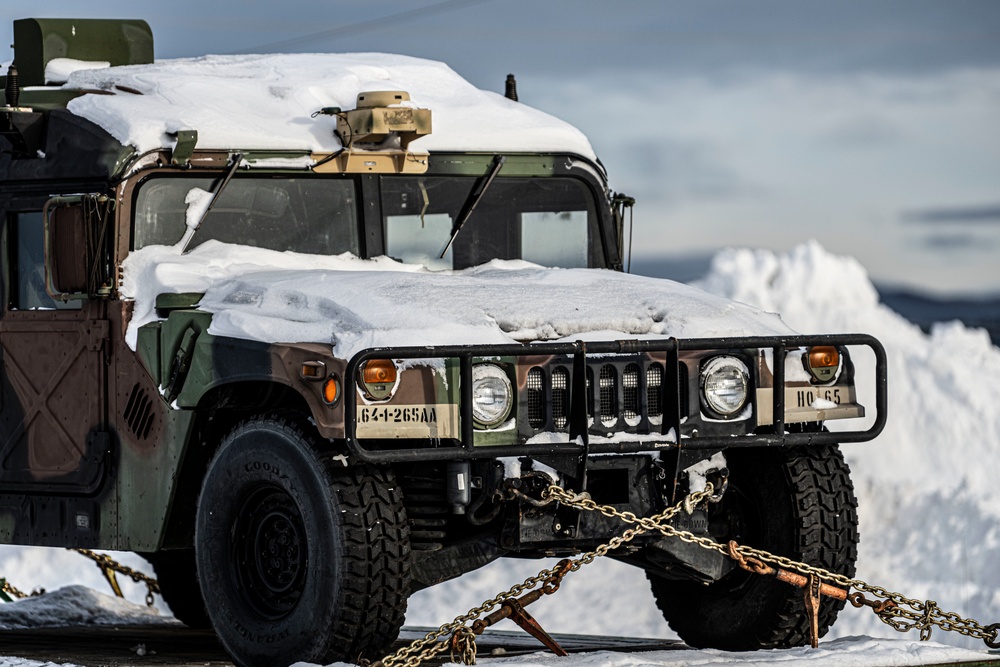 1-265th ADA unload Humvees for AE22