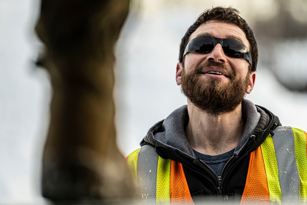 1-265th ADA unload Humvees for AE22