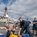 Master-at-Arms 1st Class Trenton McKibben (top), from Orlando, Fla., demonstrates takedown techniques with Sonar Technician (Surface) Seaman Jerome Bryant (bottom), from Milwaukee, Wis., during Security Reaction Force – Basic training course