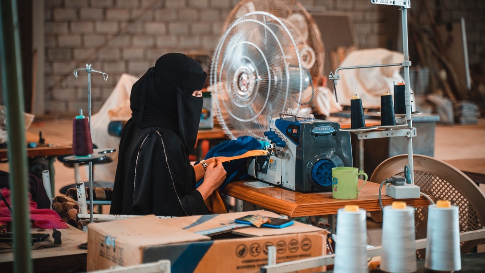 An employee works at the National Company for Leather Industries in Aden, Yemen on February 22, 2022.