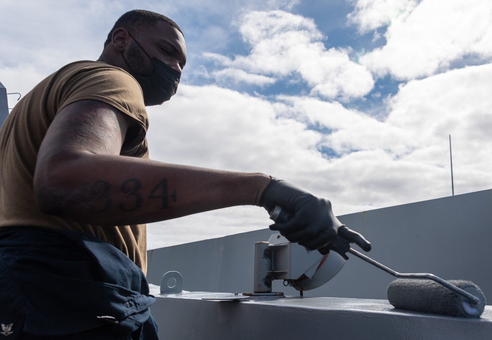 USS Portland (LPD 27) Sailors perform ship preservation