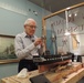 Volunteer model ship builder at Naval Museum