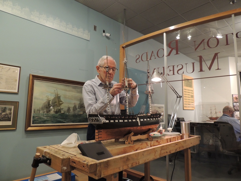 Volunteer model ship builder at Naval Museum