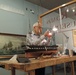 Volunteer model ship builder at Naval Museum