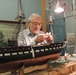 Volunteer model ship builder at Naval Museum