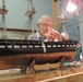 Volunteer model ship builder at Naval Museum