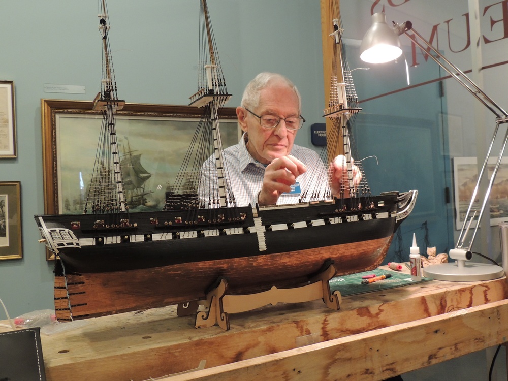 Volunteer model ship builder at the Hampton Roads Naval Museum