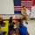 Naval Support Activity Hampton Roads Leadership Reads to Students During Read Across America Day