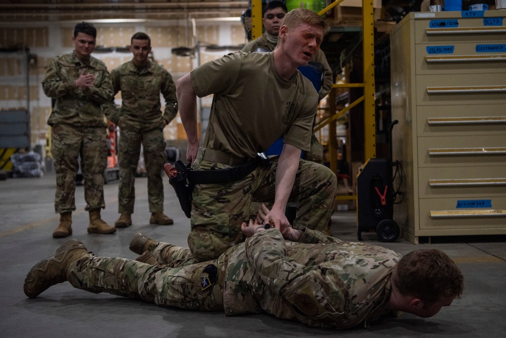 JBER defenders conduct OC spray training