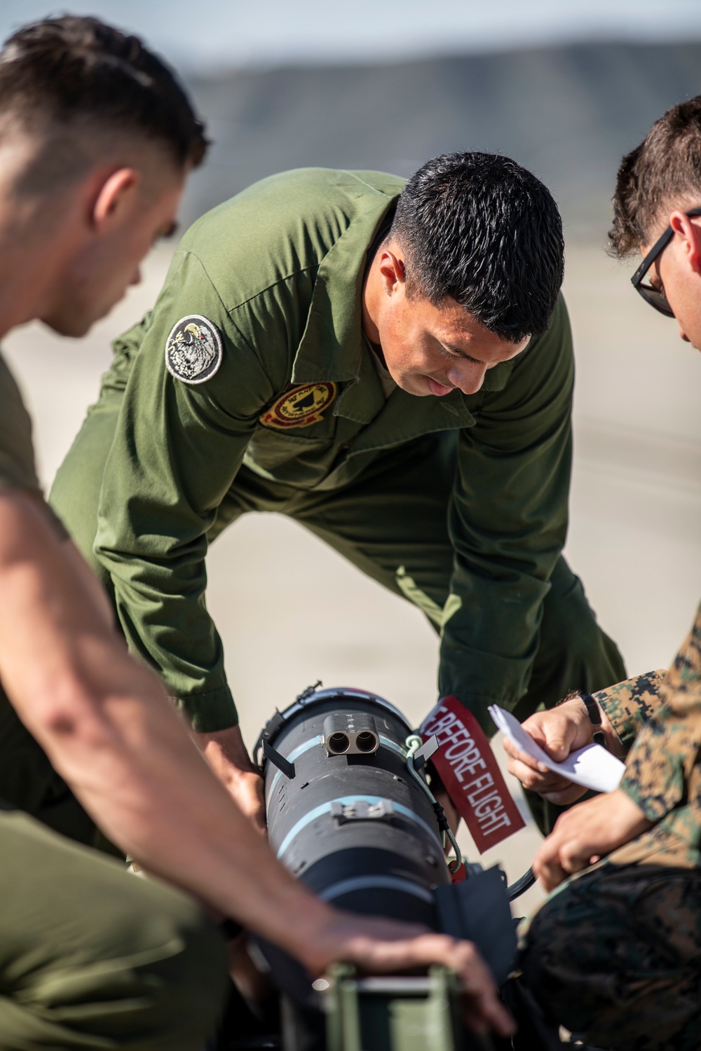 Marine Light Attack Helicopter Squadron 267 equipping the joint air-to-ground missile on Marine Corps Air Station Camp Pendleton