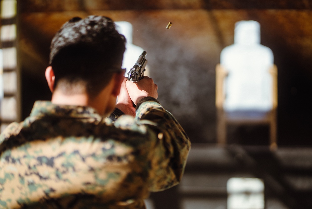 U.S. Marines with the 26th MEU participate in a Pistol Qualification Course