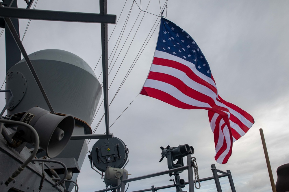 American Flag Hoisted on the mast of USS Milius (DDG 69)