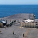 F/A-18F And C-2 Greyhound Prepare To Launch From The Flight Deck