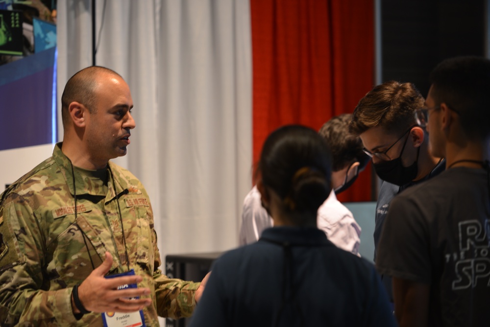 16th Air Force (AFCYBER) Airmen talk with local youth at Alamo AFCEA