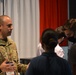 16th Air Force (AFCYBER) Airmen talk with local youth at Alamo AFCEA