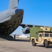 Service members load equipment for a deployment Europe