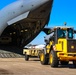 Service members load equipment for a deployment Europe